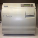 An autoclave uses pressure and heat to sterilize instruments